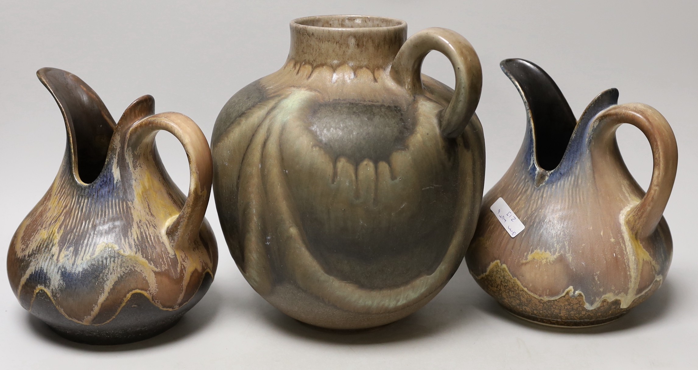 Three West German art pottery items; a pair of Dümler & Breiden, and a large ewer. Tallest 24cm